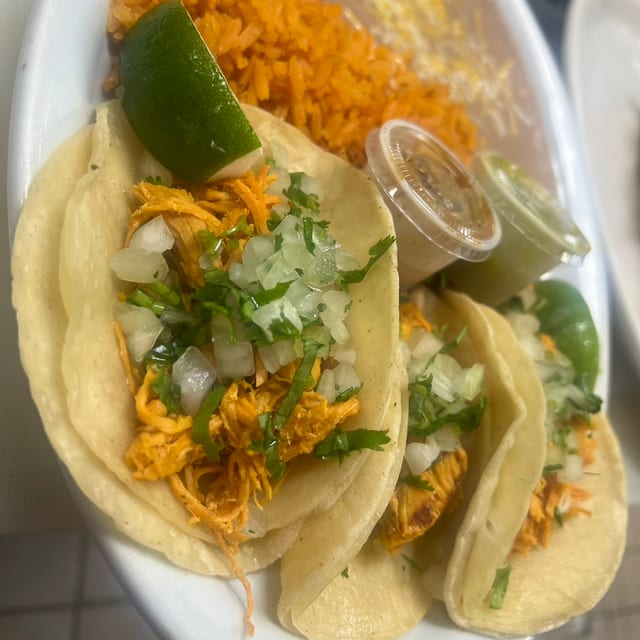 3 Tacos with Rice and Beans.